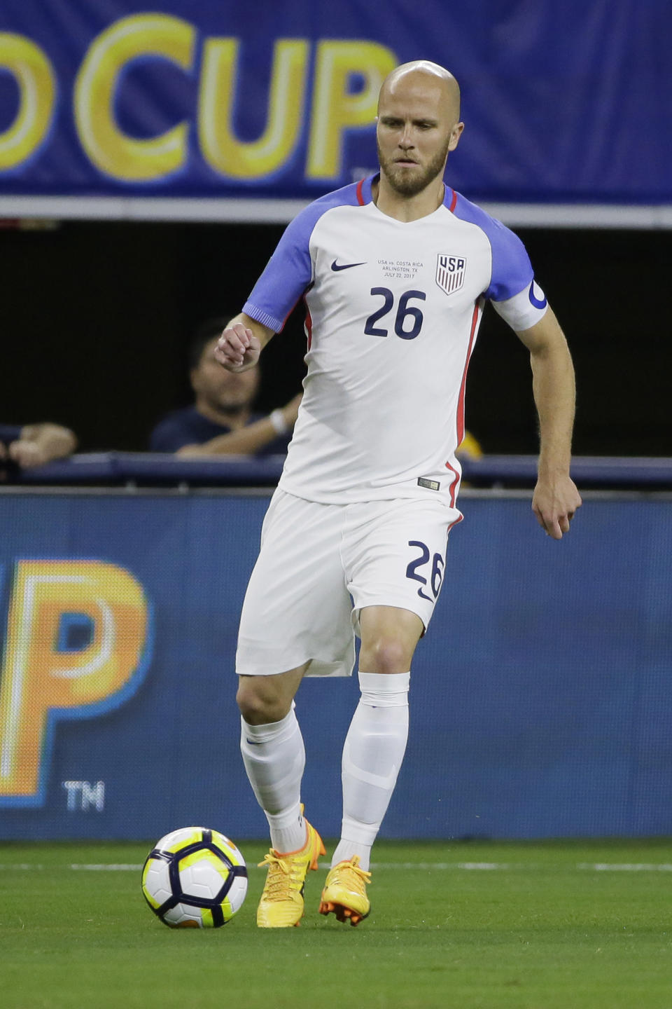 FILE - In this July 22, 2017, file photo, Michael Bradley, captain of the United States national team, dribbles the ball during a CONCACAF Gold Cup semifinal soccer match against Costa Rica, in Arlington, Texas. Bradley and goalkeeper Brad Guzan are back with the U.S. national team, two days shy of the first anniversary of the most crushing defeat in the team’s history. (AP Photo/LM Otero, File)