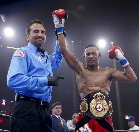 Apr 24, 2015; Chicago, IL, USA; Daniel Jacobs celebrates after winning against Caleb Truax during the Premier Boxing Championships at UIC Pavilion. Mandatory Credit: Kamil Krzaczynski-USA TODAY Sports