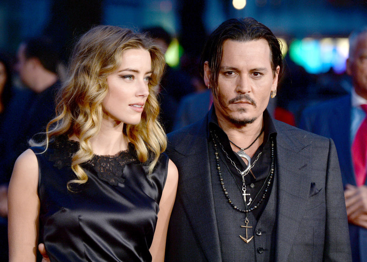 Johnny Depp and Amber Heard arriving at the BFI London Film Festival Gala Premiere of Black Mass, Odeon Cinema, Leicester Square, London
Photo Credit should read Doug Peters/EMPICS Entertainment