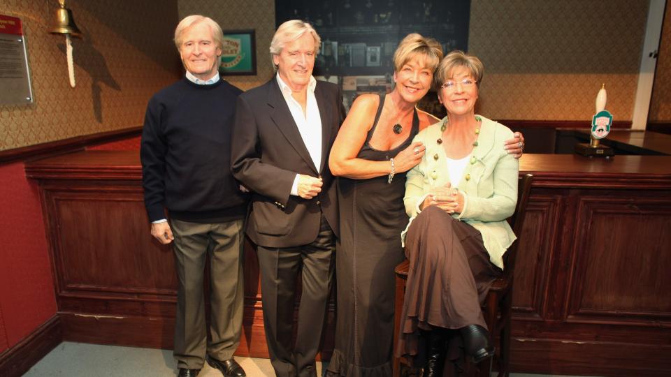 Ken and Deidre Barlow (Bill Roach and Anne Kirkbride) posing with wax models of their coronation street characters