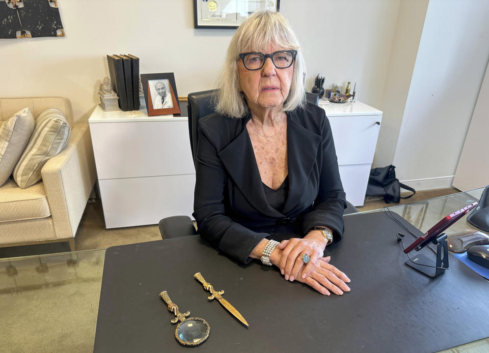 Harriet Newman Cohen, 91, whose long list of famous clients includes Andrew Cuomo and Tom Brady, poses in her law office in Times Square, New York City, Thursday, July 18, 2024. She says she still works "24-7" and thinks her age has been a benefit, that with it has come acuity, energy and keenness. "I've just been so lucky," she says, "but the president has not been so lucky." She is a devout Democrat and will give Biden her vote if he persists, but would like to see him step aside. "I would call it elder abuse, but he's doing it to himself," she said. (AP Photo/Ted Shaffrey)
