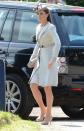 <p>The Duchess looked lovely in an elegant Jenny Packham coat and dress at a wedding in the summer of 2012. <em>(Photo: PA)</em> </p>