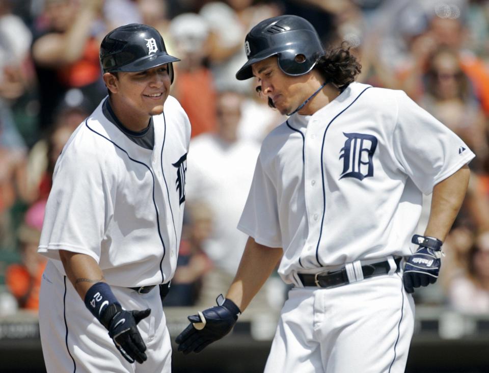 Former Detroit Tigers' Magglio Ordonez, right, is congratulated by Miguel Cabrera after hitting a solo home run in the third inning of a baseball game against the Texas Rangers Thursday, April 24, 2008, in Detroit.