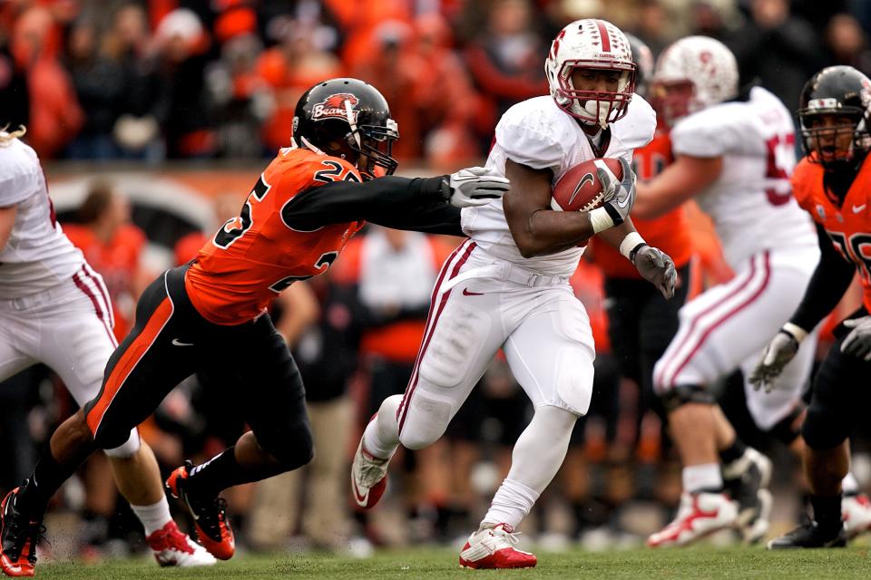 CORVALLIS, OR - NOVEMBER 5: Running back Stepfan Taylor #33 of the Stanford Cardinal rushes past safety Ryan Murphy #25 of the Oregon State Beavers on November 5, 2011 at Reser Stadium in Corvallis, Oregon. (Photo by Craig Mitchelldyer/Getty Images)