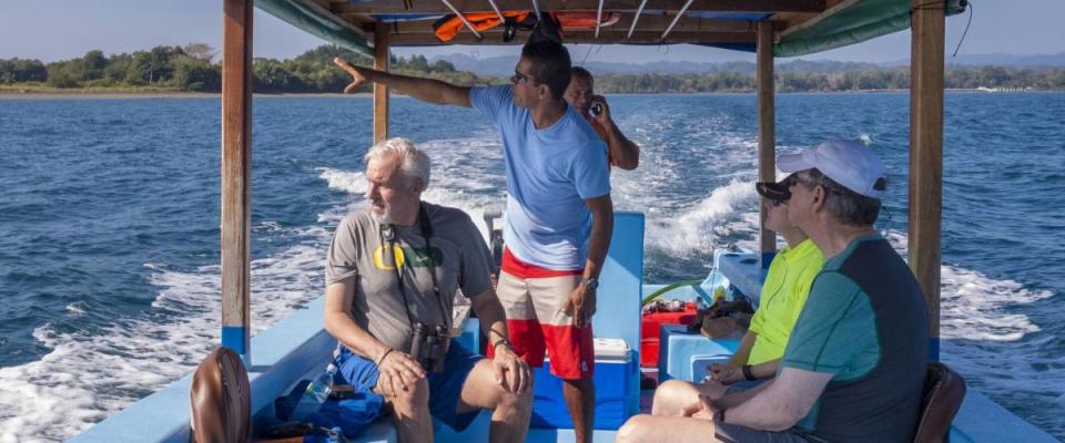 GULFO DULCE, COSTA RICA - FEBRUARY 5, 2016: Eco-tourists on boat tour, near Osa Peninsula.
