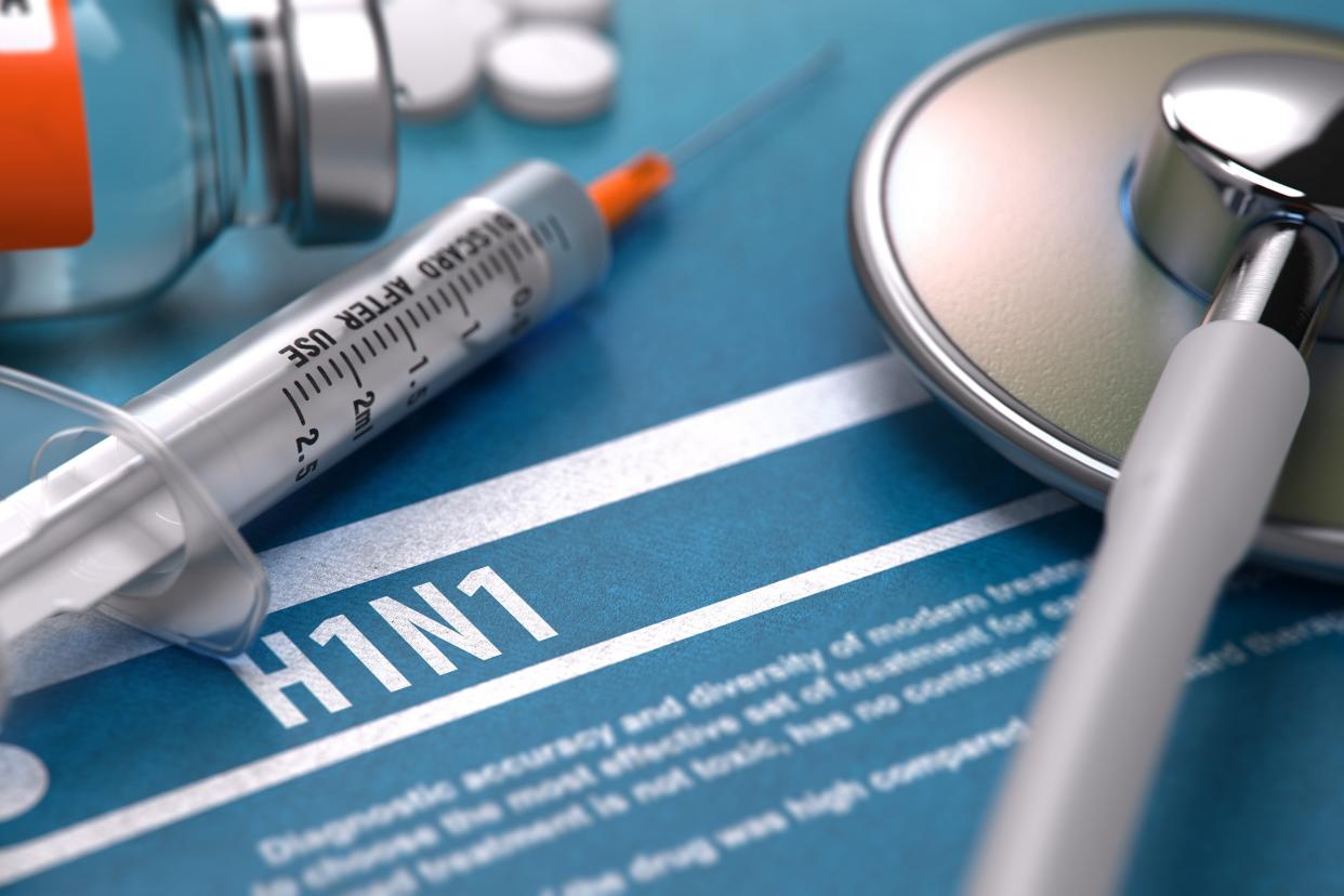 Blue background with text of H1N1 virus