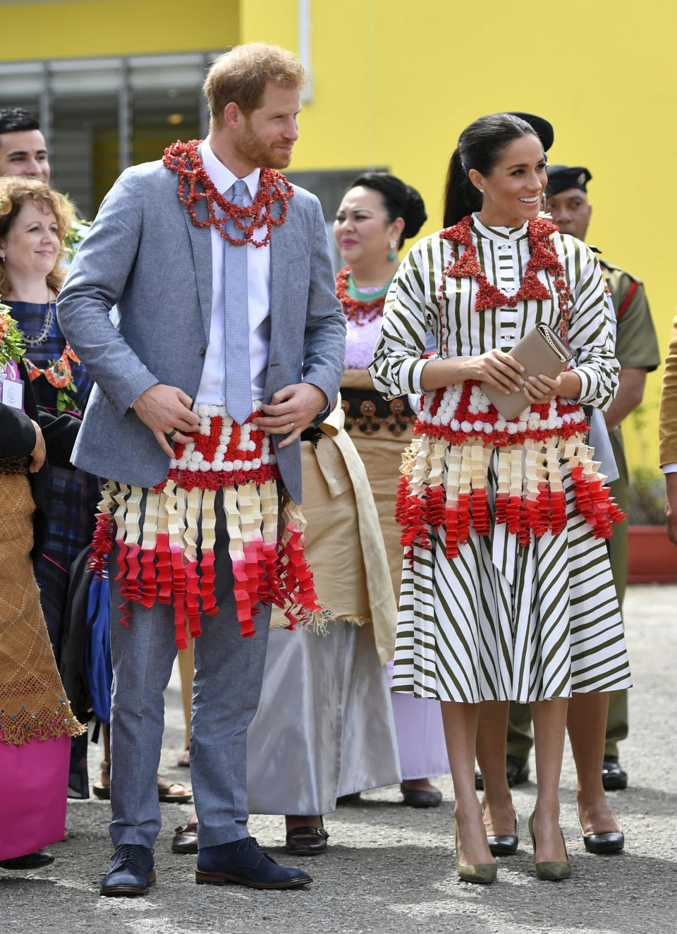 The Duke and Duchess of Sussex visit an exhibition of Tongan handicrafts, mats and tapa cloths at the Fa'onelua Convention Centre in Nuku'alofa, Tonga, Friday, Oct. 26, 2018. Prince Harry and his wife Meghan are on day 11 of their 16-day tour of Australia and the South Pacific. (Dominic Lipinski/Pool Photo via AP)