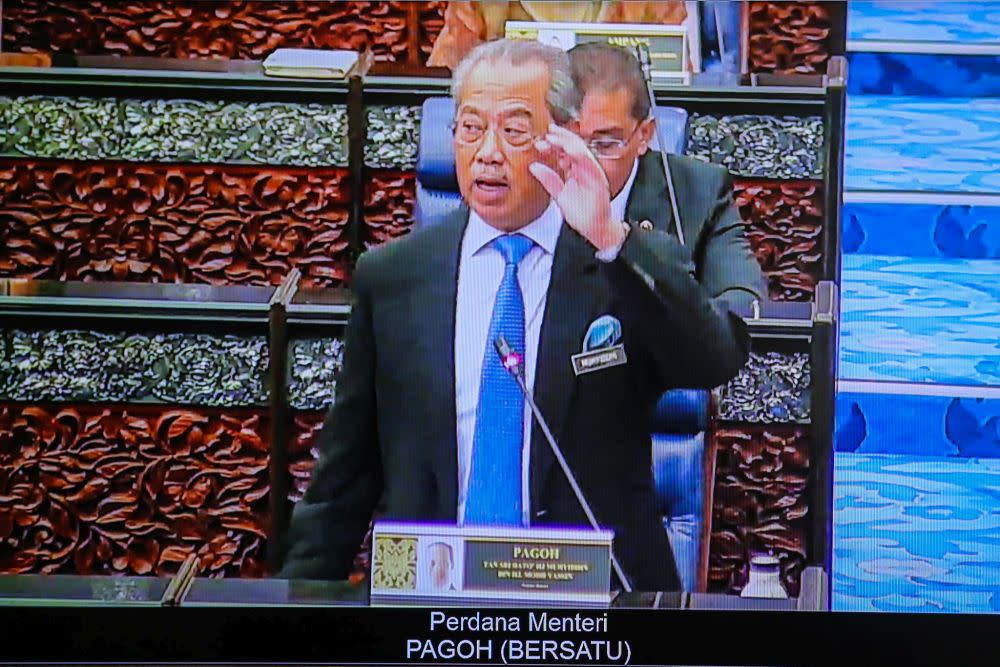 Prime Minister Tan Sri Muhyiddin Yassin delivers his speech during the second meeting of the third session of the 14th Parliament during a live broadcast in Kuala Lumpur July 13, 2020. — Picture by Hari Anggara