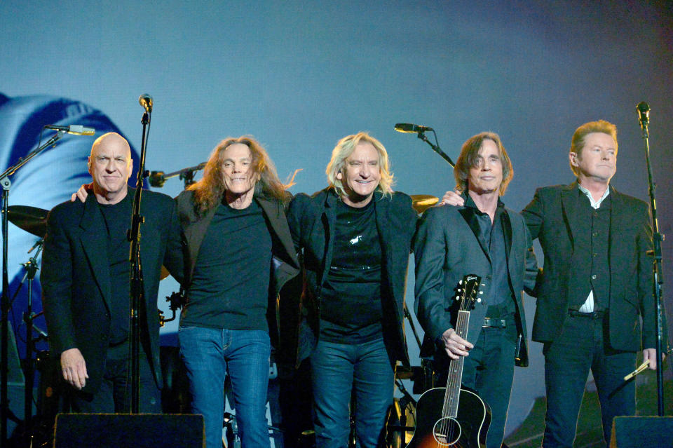 LOS ANGELES, CA - FEBRUARY 15:  Musicians Bernie Leadon,  Timothy B. Schmit, Joe Walsh and Don Henley of The Eagles perform with Jackson Browne (2nd from R) onstage during The 58th GRAMMY Awards at Staples Center on February 15, 2016 in Los Angeles, California.  (Photo by Lester Cohen/WireImage)