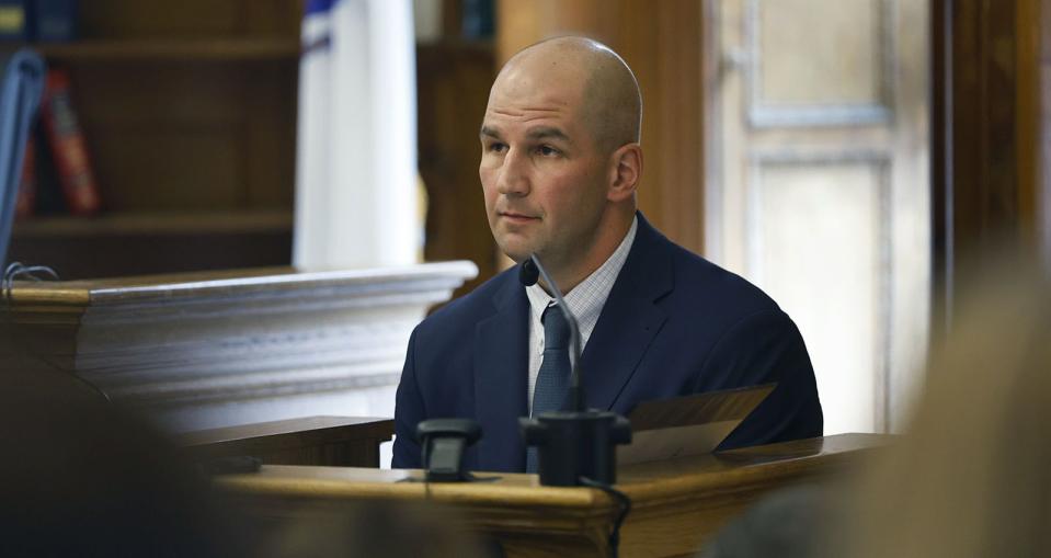 Mass State Police Trooper Michael Proctor listens on the witness stand during the Karen Read murder trial, Wednesday, June 12, 2024, in Norfolk Super Court in Dedham, Mass. Read is facing charges, including second degree murder, in the 2022 death of her boyfriend Boston Officer John O’Keefe. (Greg Derr/The Patriot Ledger via AP, Pool)