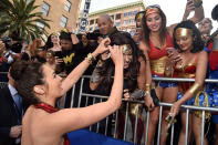 <p>Gadot greets the Wonder Women in the crowd. (Photo: Alberto E. Rodriguez/Getty Images) </p>