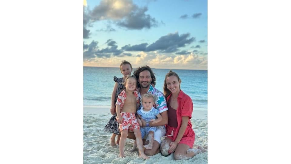 Joe Wicks and his family on the beach