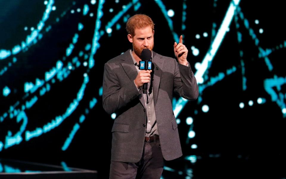 Prince Harry addresses young people at a WE Day event at Wembley - REUTERS