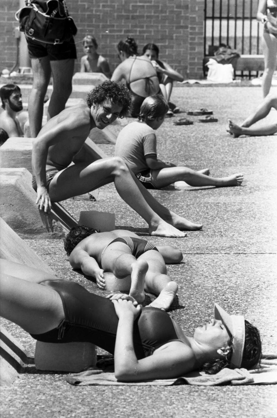 June 27, 1980: University of Texas at Arlington students attempt to melt 10-pound blocks of ice during a contest at the Non-Invitational Belly Flop and George Hamilton Tan Competition. Jerry Hoefer/Fort Worth Star-Telegram archives/UT Arlington Special Collections