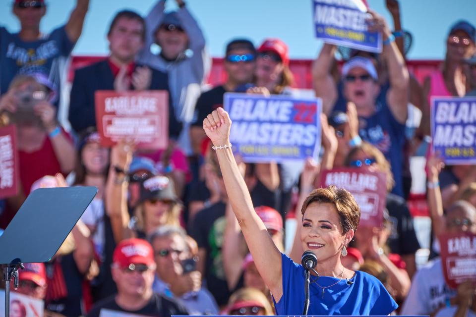 Gubernatorial candidate Kari Lake delivers remarks during former President Donald Trump's rally in Mesa on Oct. 9, 2022.