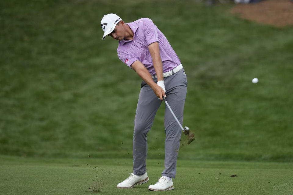 Christiaan Bezuidenhout, of South Africa, hits from the fifth fairway during the second round of the Players Championship golf tournament Friday, March 10, 2023, in Ponte Vedra Beach, Fla. (AP Photo/Charlie Neibergall)