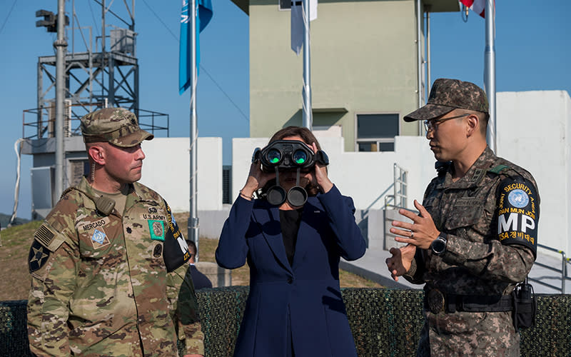 Vice President Harris looks through binoculars in the Demilitarized Zone separating the two Koreas