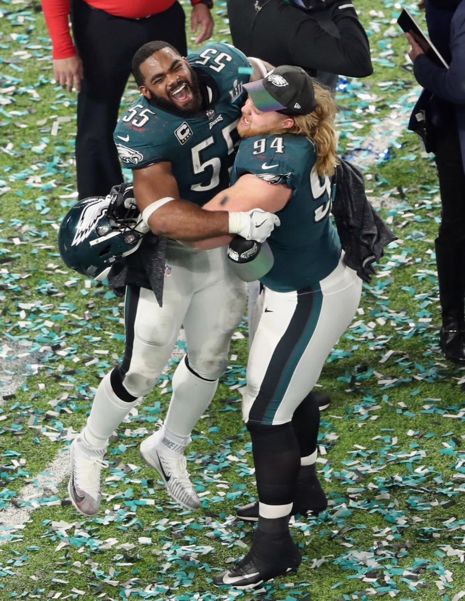 <p>Brandon Graham #55 and Beau Allen #94 of the Philadelphia Eagles celebrate winning Super Bowl LII against the New England Patriots at U.S. Bank Stadium on February 4, 2018 in Minneapolis, Minnesota. (Photo by Christian Petersen/Getty Images) </p>