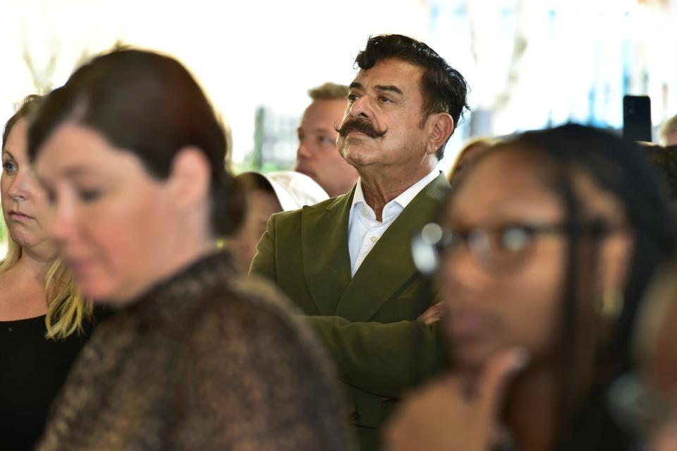 Jacksonville Jaguars owner  Shad Khan watches Monday during the team's "community huddle" at Strings Sports Brewery about the proposed design for the "stadium of the future." The session at Strings was the first of 14 town hall style meetings the Jaguars will have across the city.