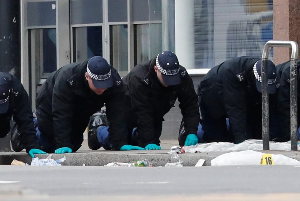 Police conduct a finger tip search following the terror attack in Streatham High Road (Aaron Chown/PA) (PA Archive)