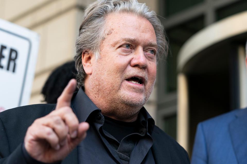 Former White House strategist Steve Bannon speaks with reporters as he departs federal court on Friday, July 22, 2022, in Washington.