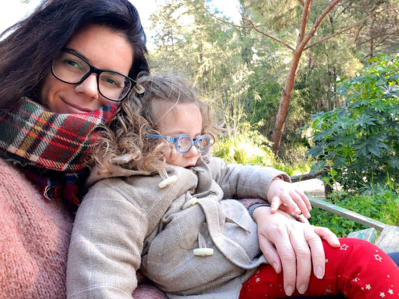 Deniz Birinci poses for a photo with her daughter Olivia Shule, following the coronavirus disease (COVID-19) outbreak, in Nicosia