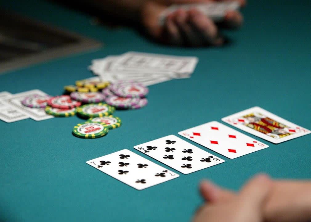 Cards and chips laid out on poker table at World Series.