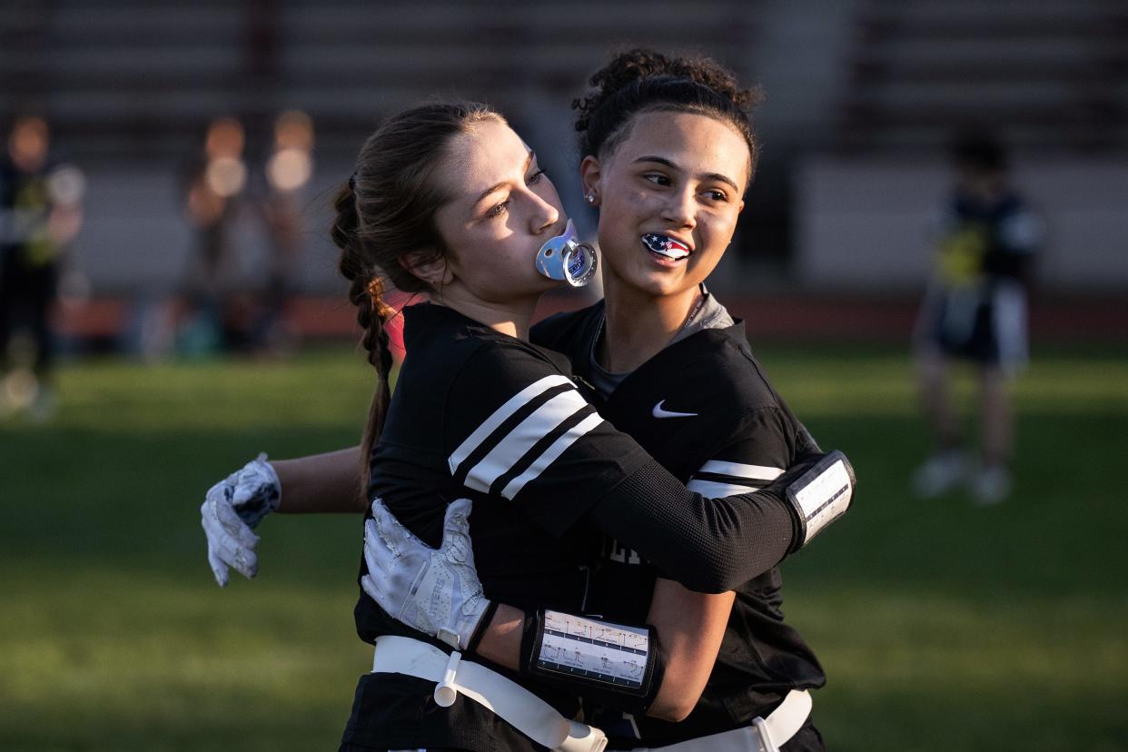 Leominster's Hailey Jimenez, left, and Jazmyne Vazguez embrace after Jimenez scored against Fitchburg on Thursday at Crocker Field.