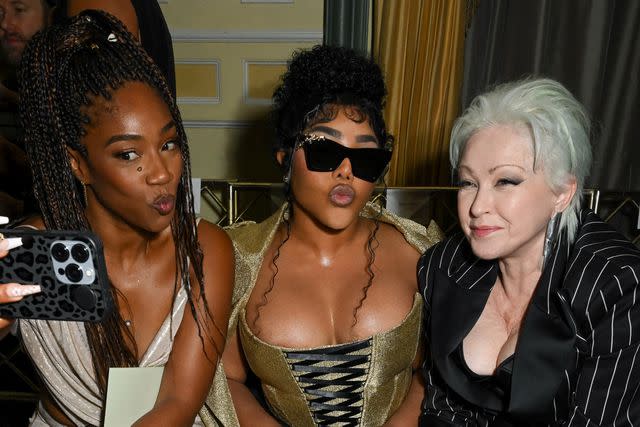 <p>Gilbert Flores/WWD via Getty</p> Tiffany Haddish, Lil' Kim and Cyndi Lauper.