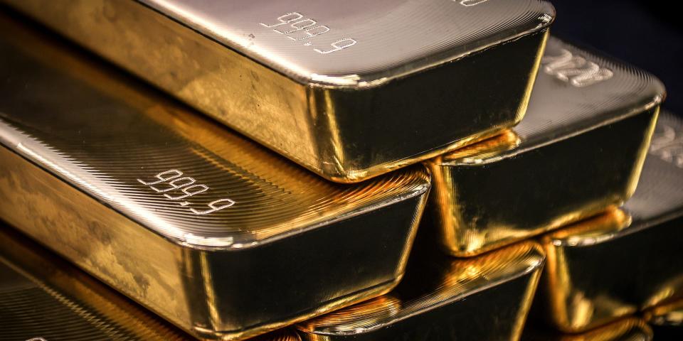 Gold bullion bars are pictured after being inspected and polished at the ABC Refinery in Sydney on August 5, 2020.