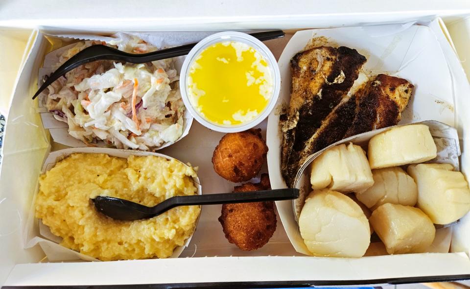 The Cortez Special with blackened grouper, sauteed scallops, cheese grits, coleslaw and hush puppies at Star Fish Company in Cortez photographed Sept. 30, 2023.