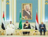 Abu Dhabi's Crown Prince Sheikh Mohammed bin Zayed al-Nahyan, Saudi Crown Prince Mohammed bin Salman and Yemen's President Abd-Rabbu Mansour Hadi are seen, in Riyadh