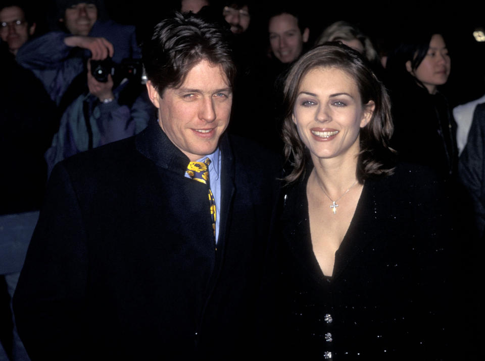 Actor Hugh Grant and actress Elizabeth Hurley attend the "Restoration" New York City Premiere on December 10, 1995 at the Ziegfeld Theater in New York City. (Photo by Ron Galella, Ltd./Ron Galella Collection via Getty Images)