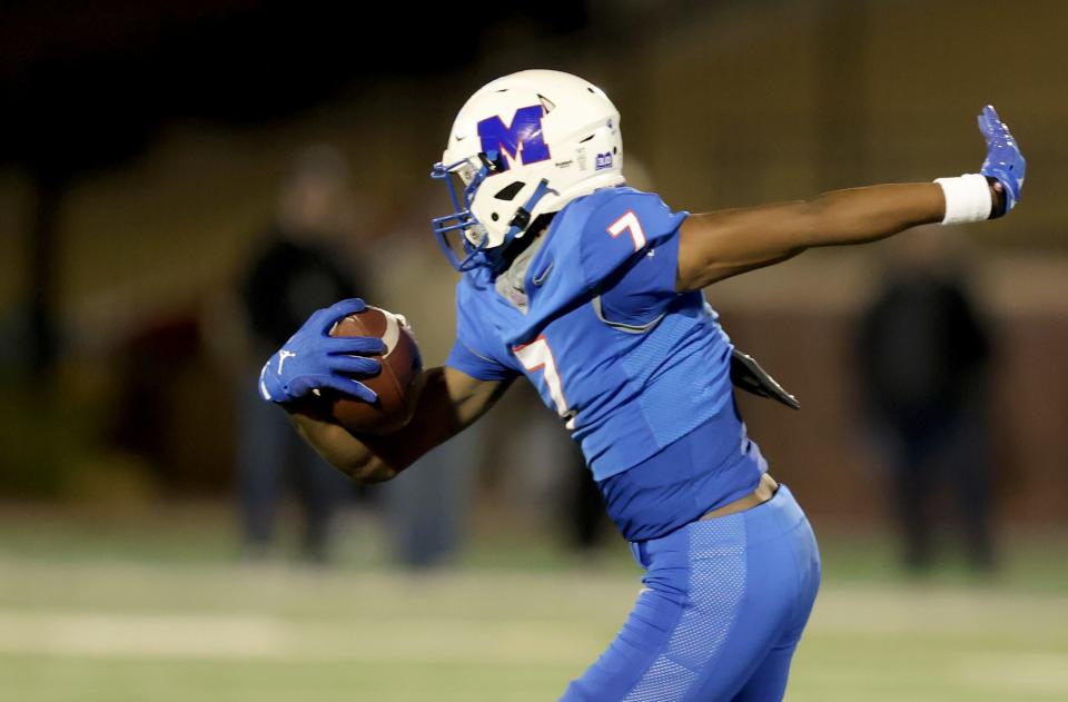 Millwood's Jaden Nickens returns an interception for a touchdown during the Class 2A championship game against Washington on Saturday night at the University of Central Oklahoma's Chad Richison Stadium in Edmond.