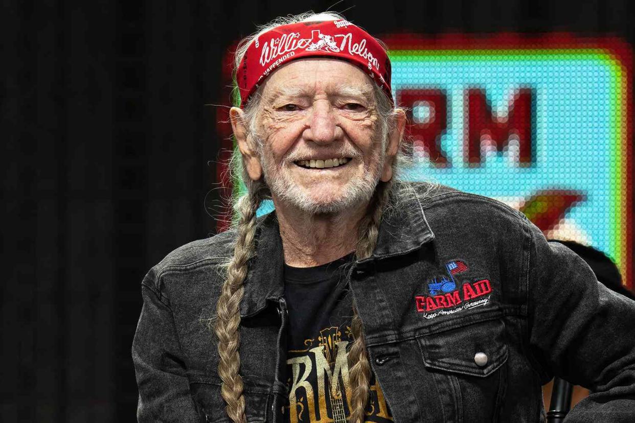 <p>Suzanne Cordeiro/AFP/Getty</p> Willie Nelson attends a press conference during the Farm Aid 2022 music festival