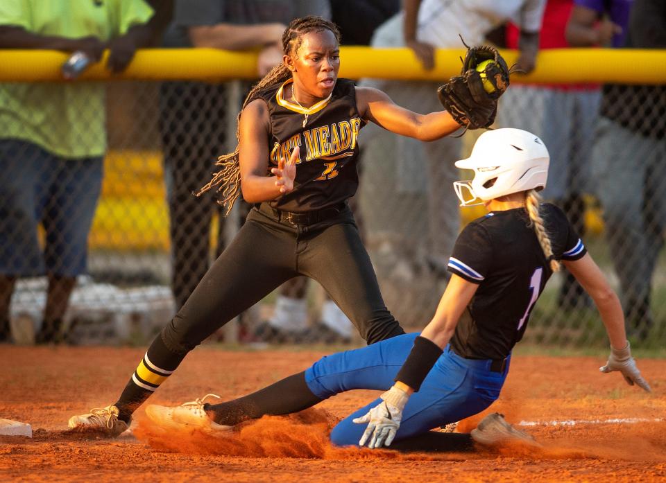 Fort Meade (11) Nakaia Pinkston tags out Lakeland Christian (1) Rylan Rollyson at third base during the Class 2A, Region 3 softball: tournament at Fort Meade High School in Fort Meade Fl. Wednesday May 8, 2024.
Ernst Peters/The Ledger