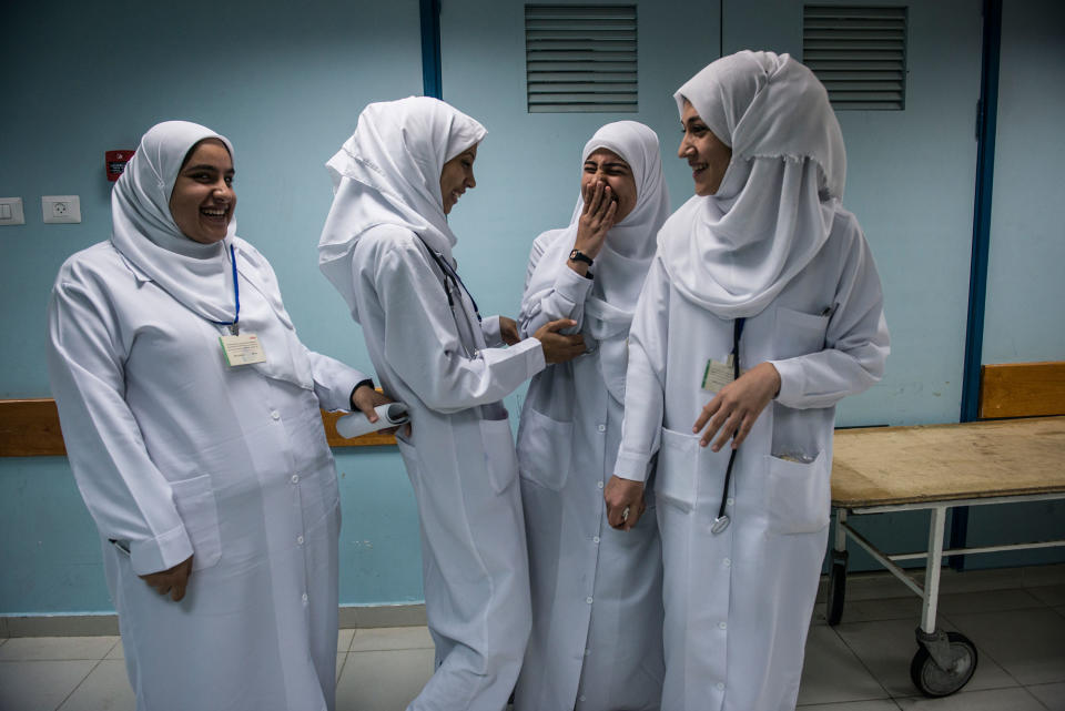 <p>Medical students from Islamic University on break in the Maternity Ward of Al-Shifa Hospital in Gaza. (Photograph by Monique Jaques) </p>
