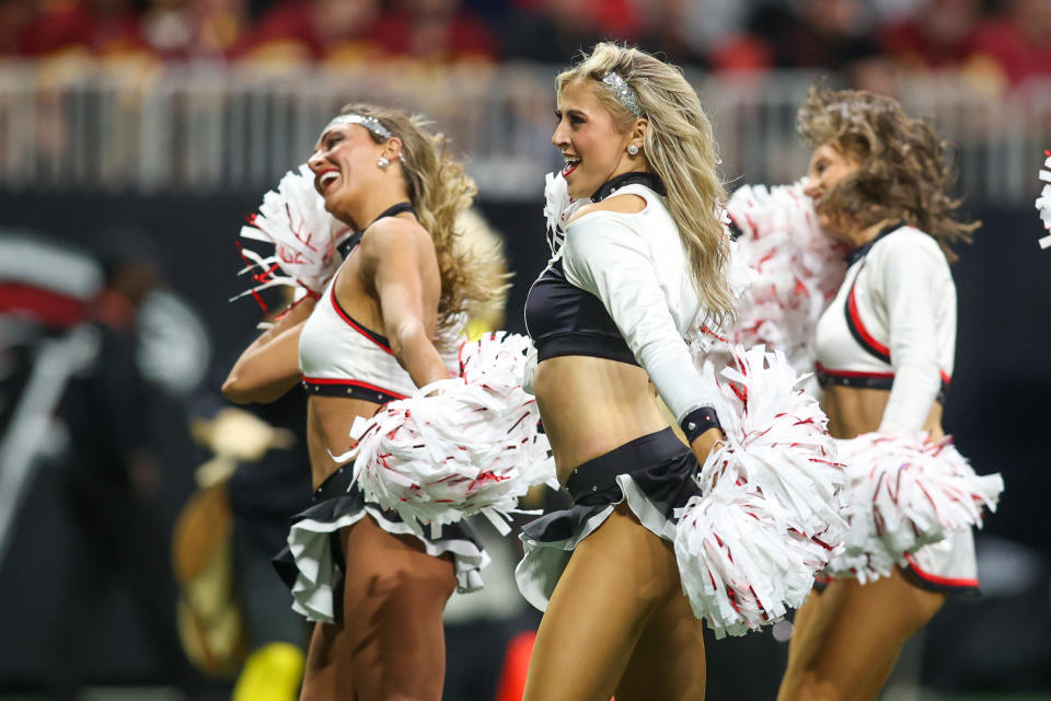 Oct 15, 2023; Atlanta, Georgia, USA; An Atlanta Falcons cheerleader performs against the Washington Commanders in the second quarter at Mercedes-Benz Stadium. Mandatory Credit: Brett Davis-USA TODAY Sports