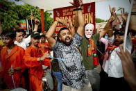 Bharatiya Janata Party (BJP) supporters dance inside the party office after hearing of a candidate's victory during the counting in India's national election, in New Delhi, India, Tuesday, June 4, 2024. Prime Minister Narendra Modi's Hindu nationalist party showed a comfortable lead Tuesday, according to early figures reported by India's Election Commission, but was facing a stronger challenge from the opposition than had been expected. (AP Photo/Manish Swarup)