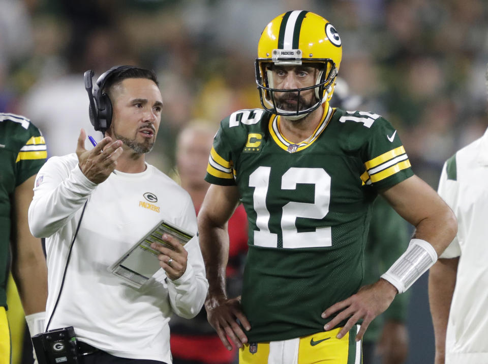 Sep 18, 2022; Green Bay, Wisconsin, USA; Green Bay Packers head coach Matt LaFleur talks with quarterback Aaron Rodgers (12) in between quarters against the Chicago Bears during their football game at Lambeau Field. Mandatory Credit: Dan Powers/USA TODAY NETWORK-Wisconsin