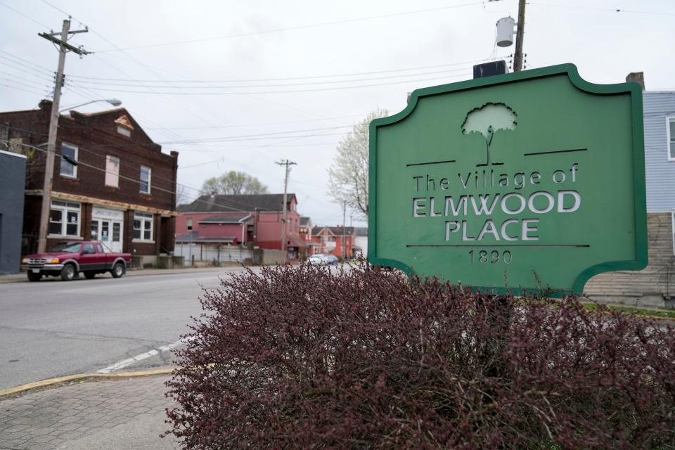 A sign welcomes visitors to Elmwood Place, incorporated in 1890 and once home to about 4,000 Cincinnatians.