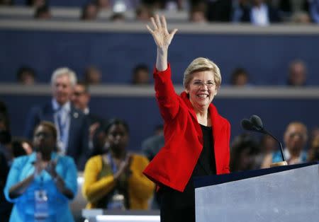 Senator Elizabeth Warren (D-MA) waves during the Democratic National Convention in Philadelphia, Pennsylvania, U.S. July 25, 2016. REUTERS/Lucy Nicholson