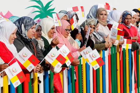 People wait for Pope Francis arrival at a rural social service centre run by the Daughters of Charity of Saint Vincent de Paul in Temara near Rabat, Morocco, March 31, 2019. REUTERS/Remo Casilli