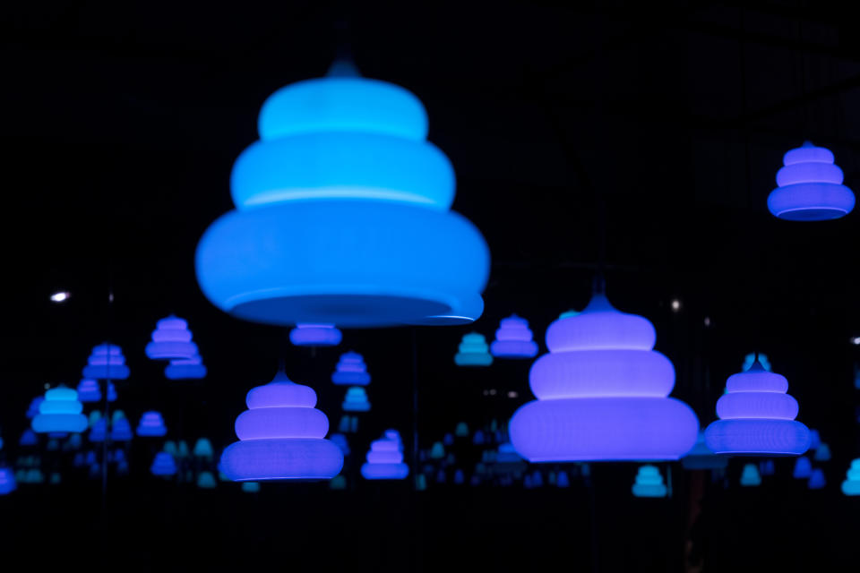 In this Tuesday, June 18, 2019, photo, poop-shaped lights hang in a room at the Unko Museum in Yokohama, south of Tokyo. In a country known for its cult of cute, even poop is not an exception. A pop-up exhibition at the Unko Museum in the port city of Yokohama is all about unko, a Japanese word for poop. The poop installations there get their cutest makeovers. They come in the shape of soft cream, or cupcake toppings. (AP Photo/Jae C. Hong)