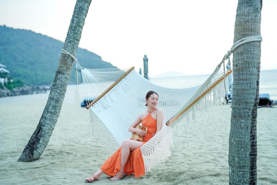 沙灘椰影之間的白色吊床，也是拍美照的好地方。