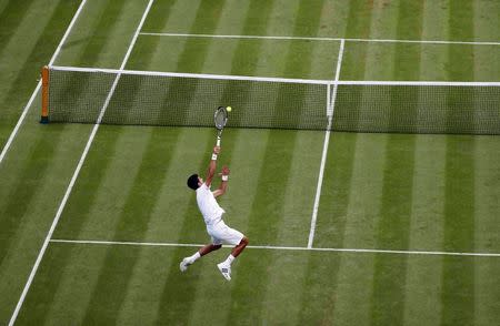 Britain Tennis - Wimbledon - All England Lawn Tennis & Croquet Club, Wimbledon, England - 2/7/16 Serbia's Novak Djokovic reacts during his match against USA's Sam Querrey REUTERS/Stefan Wermuth