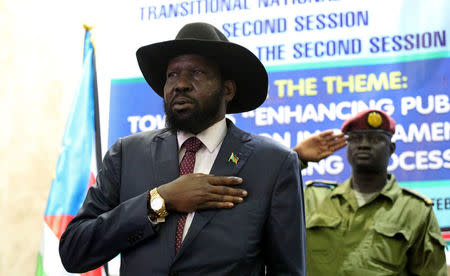 South Sudan's President Salva Kiir listens to the national anthem before addressing the second session of the Transitional Government of National Unity (TGoNU) at the Parliament in South Sudan's capital Juba, February 21, 2017. REUTERS/Jok Solomon