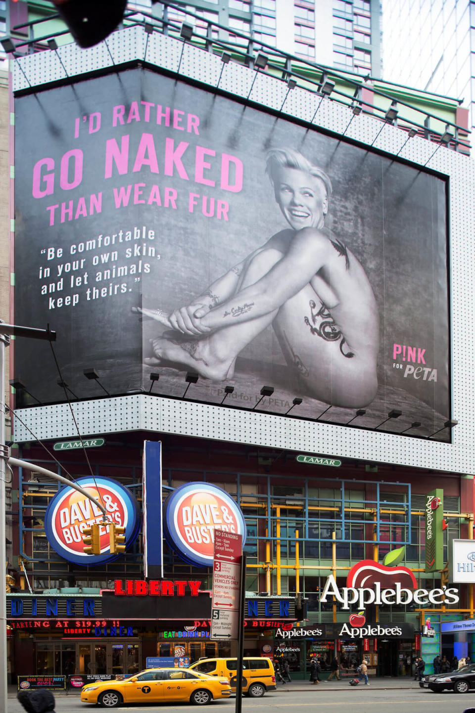 Pink's "I'd Rather Go Naked Than Wear Fur" PETA campaign was posted in New York City's Times Square. (Photo: PETA)