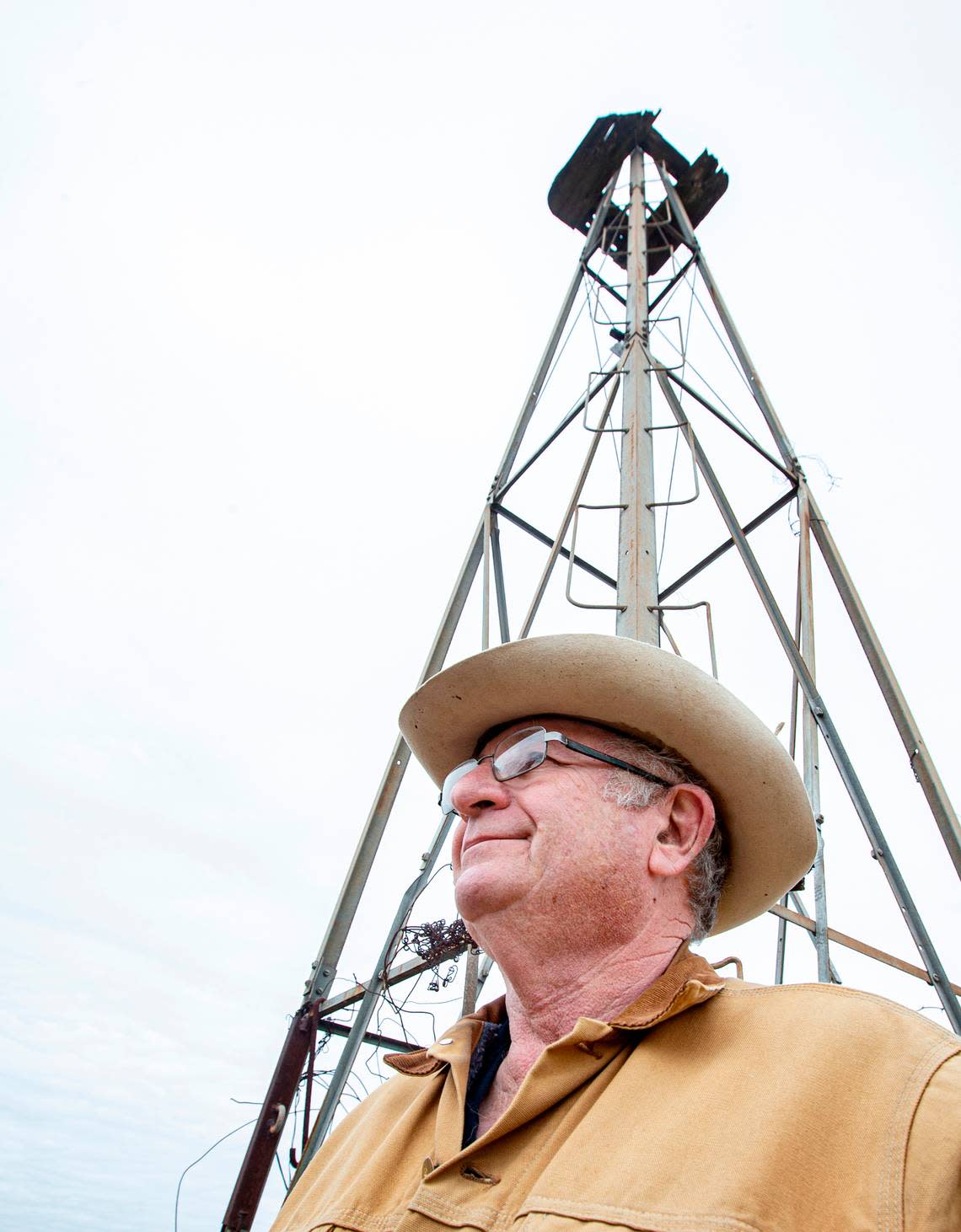 MIke Massy stands next to an old water well on his ranch in Hood County that dried up. Massey said he drilled a new well a few feet away that has worked for years.