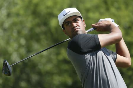 Tony Finau watches his tee shot on the ninth hole during the second round of the Valero Texas Open golf tournament at TPC San Antonio - AT&T Oaks Course. Mandatory Credit: Soobum Im-USA TODAY Sports